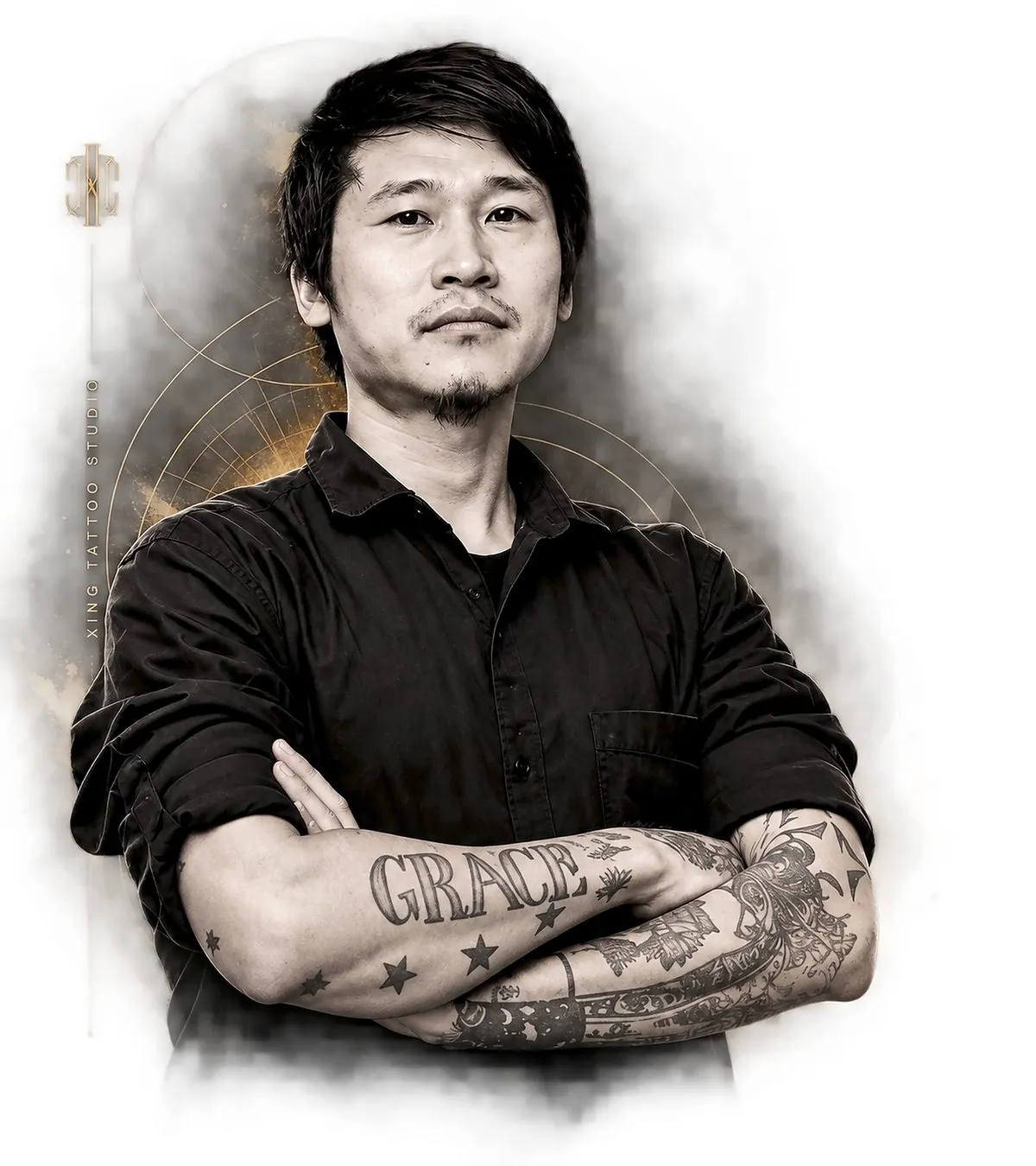 Peace (Chingri Awungshi), best tattoo artist in Brookefield, Bengaluru, arms crossed showing tattooed forearms at XING Tattoo Studio